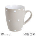 O esmalte da cor 12oz pontilha a caneca